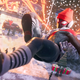 Miles Morales swings over New York Christmas decorations.